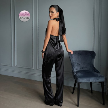 Black satin evening set with an asymmetrical tunic and wide trousers