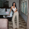 Elegant women's trousers with a wide belt, buckles and flared leg