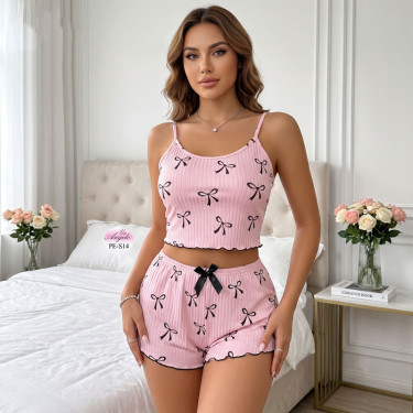 Pink women's set with a short top, shorts and a delicate ribbon print