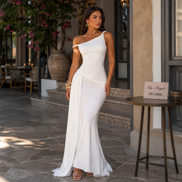 Long white dress with an asymmetrical neckline, dropped shoulder and twisted elements