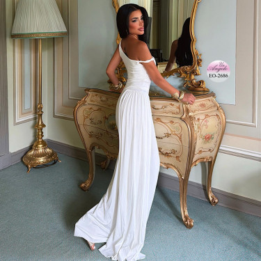 Long white dress with an asymmetrical neckline, dropped shoulder and twisted elements